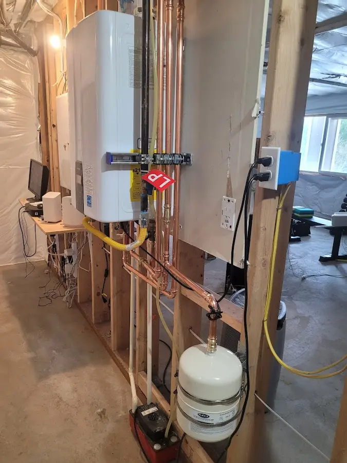 Licensed plumber repairing a kitchen sink in Spring Hill